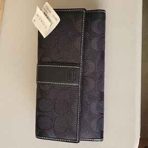 New never used Coach checkbook wallet